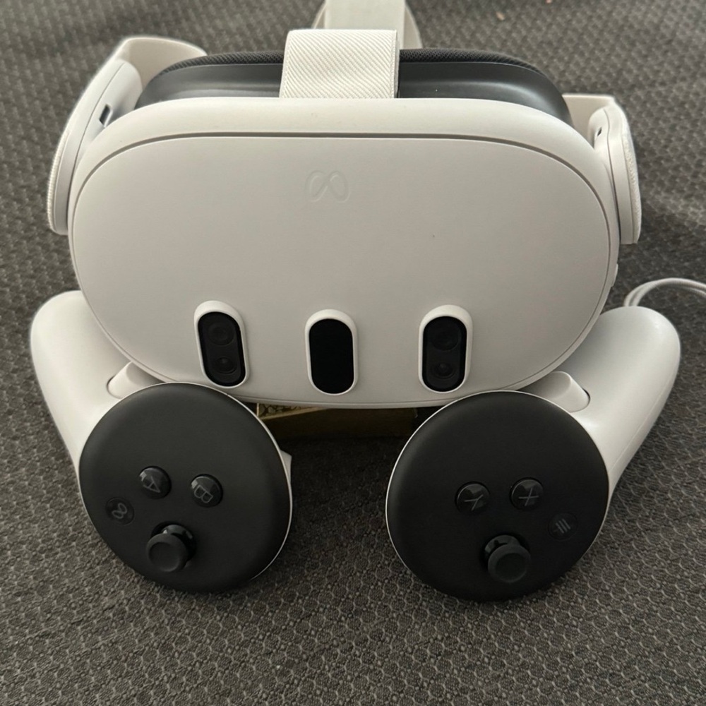 White VR Headset with Black Controllers